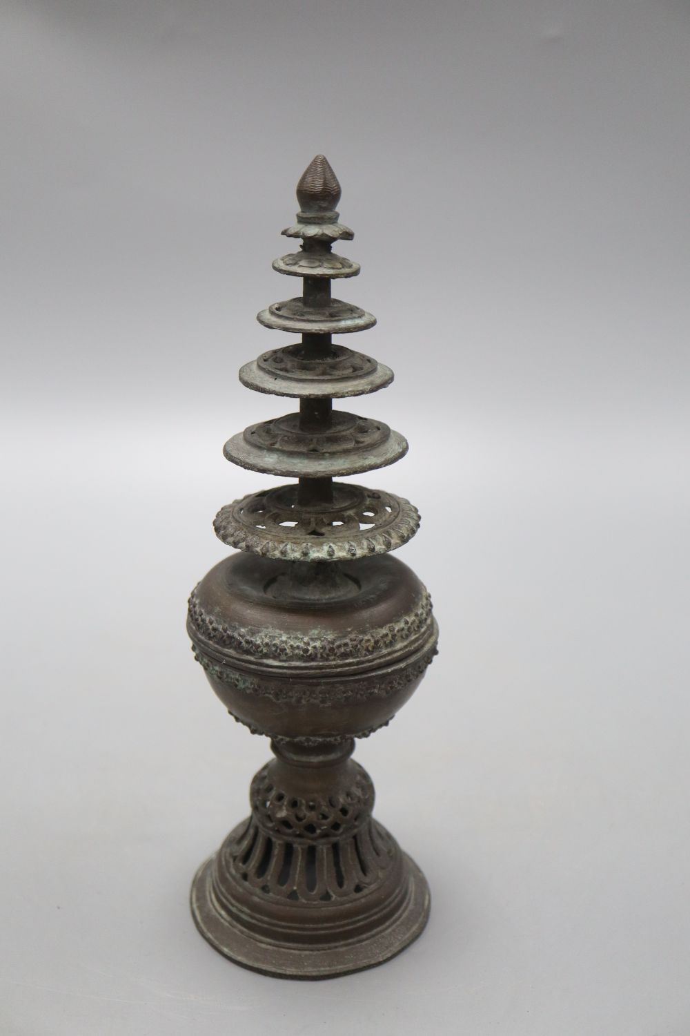 A 19th century bronze model of a stupa, height 26cm